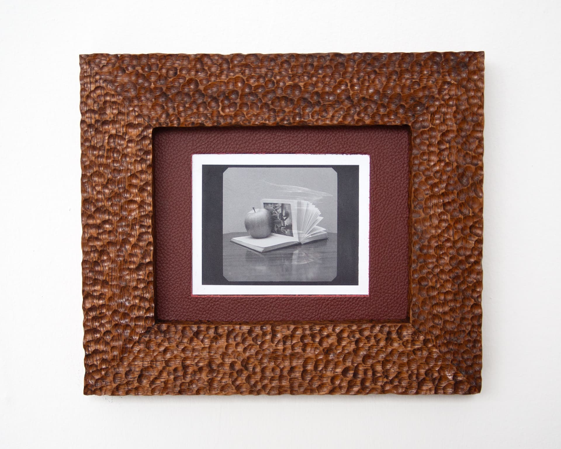 'An apple, a book, and a table'