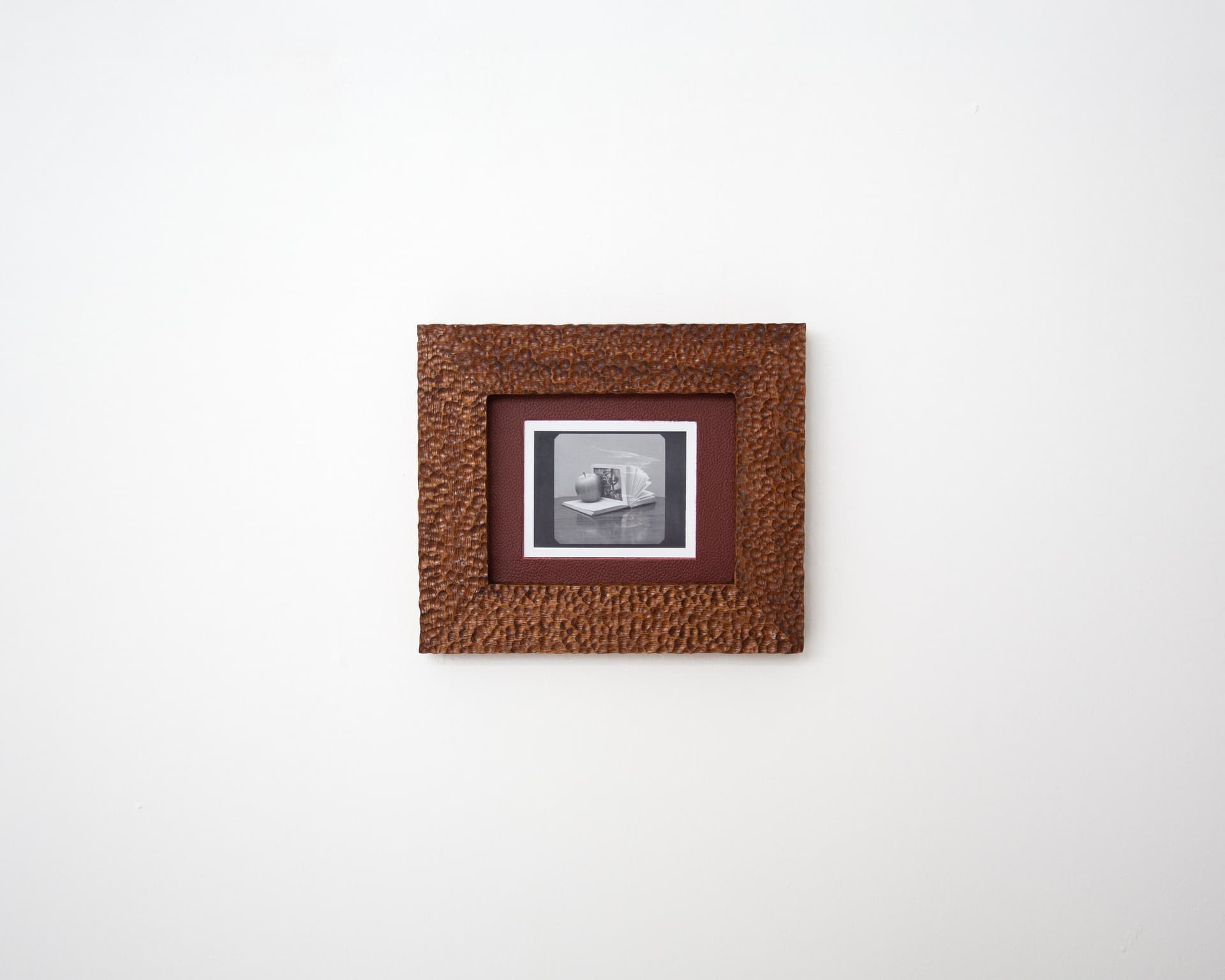 'An apple, a book, and a table'